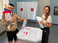 Улыбка малышки Елизаветы украсила выборный день 